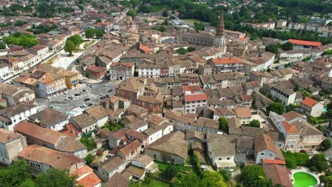 Aerial view around the old town of Caussade in France Stock-Footage 336731329