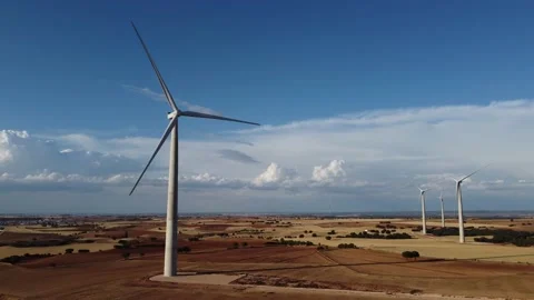 Aerial view around windmills Stock Footage 218389801