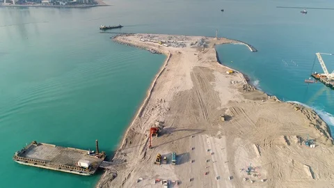 Aerial view of artificial island under construction, Dubai, U.A.E. Stock Footage