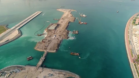 Aerial view of artificial island under construction, Dubai, U.A.E. Stock Footage 103032400