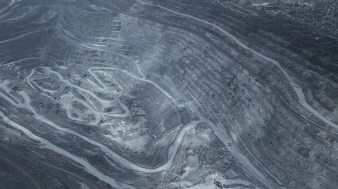Aerial view of asbestos opencast mining quarry Stock Footage 99104523