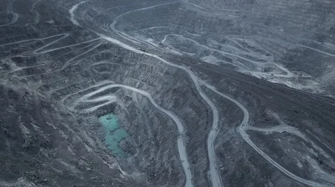 Aerial view of asbestos opencast mining quarry Stock Footage 99104561