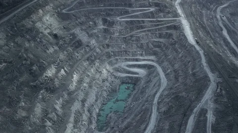 Aerial view of asbestos opencast mining quarry Stock Footage 99104579