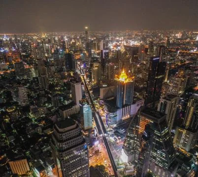 Aerial view of Asoke intersection and sky train station in Bangkok Thailand Photos