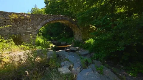 Aerial view Aterenski bridge, an old roman bridge in the Rhodope mountain near  Video stock 283761253
