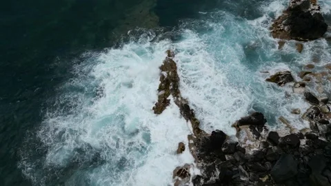 Aerial View of Atlantic Waves Crashing on Rocky Coast at Buenavista del Norte Stock Footage 346002684