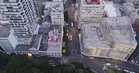 Aerial view of Auckland city skyline & skytower in the evening sunset, New Stock Footage