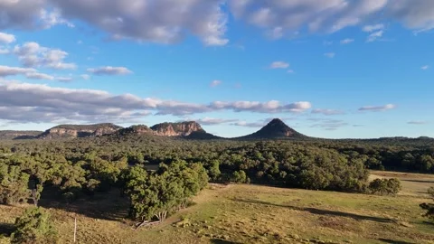 Aerial View of Australian Paddock with Trees and Sandstone Formations Stock Footage 283932327