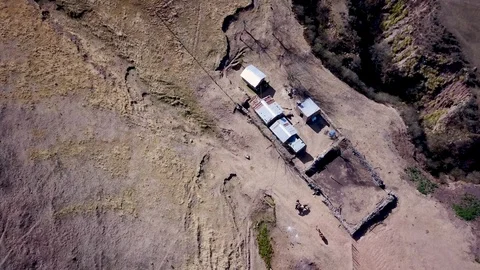 Aerial view of authentic mountain house and surroundings Stock Footage 89797175