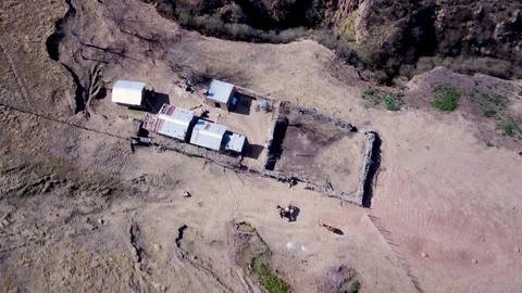 Aerial view of authentic mountain house and surroundings, descending aerial shot Stock Footage 89800175