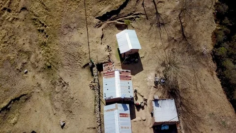 Aerial view of authentic mountain house and surroundings, CRANE aerial shot Stock Footage 89823583