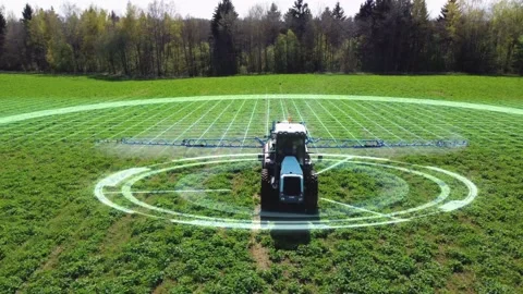 Aerial view of autonomous self-driving tractor with autopilot spraying mineral, Stock Footage 154044431