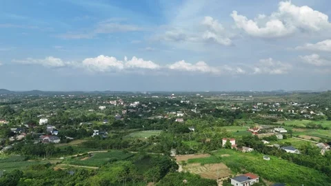 Aerial view of Ba Vi plain in Hanoi with lush green rice fields. Stock Footage 325985494