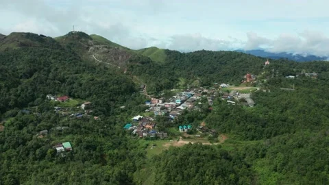 Aerial view of Baan E-Tong in the middle of the mountains Stock Footage 144659806