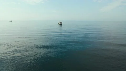 Aerial view, Back view, Cargo Ship, Far Away, Morning, Sun Rise Stock-Footage 163095047