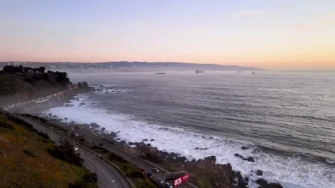 Aerial view backwards of vina del mar and renaca at sunset. Stock Footage 157450108