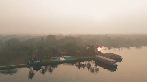 Aerial view of backwaters and sunset of Kerala Stock Footage 303693014