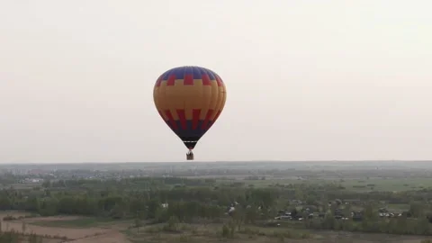 Aerial view balloon flying at sunset Stock Footage 159653627
