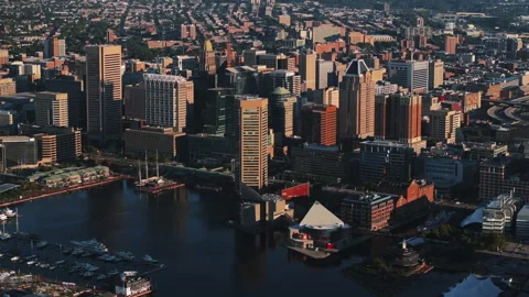 Aerial view of Baltimore's Inner Harbor at sunrise Stock Footage 345860153