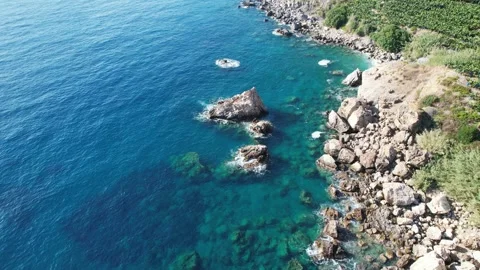 Aerial view of the banana beach without people Sea view from a drone with azure Stock Footage 242607697