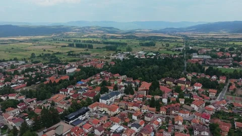 Aerial view of Bansko town and green valley in Bulgaria Stock Footage 343645546