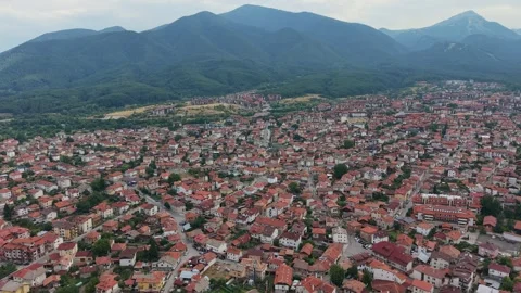 Aerial view of Bansko town and Pirin mountains in Bulgaria Stock Footage 343645943