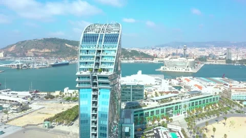 Aerial View Of Barcelona And Drone Footage Of W Hotel On Barceloneta Beach 動画素材 139020249