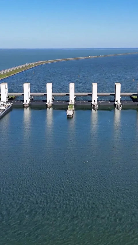 Aerial View Of Barge Passing Through Storm Surge Barrier Видео 335476130