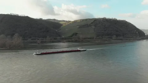 Aerial View Of A Barge Transporting Cargo Across A River With Roads. Stock Footage 297919419