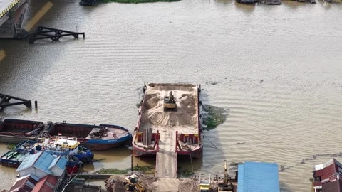 Aerial view of a barge transporting sand during the unloading process using.. Video stock 336473933