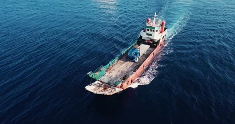 Aerial view of barge transporting single truck Stock Footage 161709195