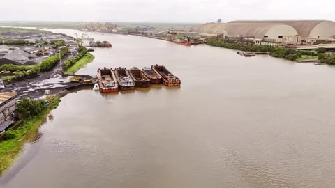 Aerial View of Barges Docked on a River Stock Footage 290162730