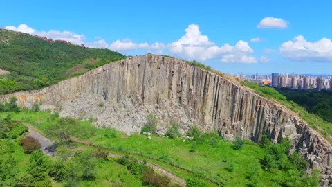 Aerial view of basalt columnar jointing rock formations at Mashan Stone Forest Vídeo Stock 345630170