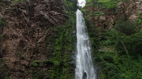 Aerial View of the Base of Wli Falls and Plunge Pool in Ghana Stock Footage 330861251