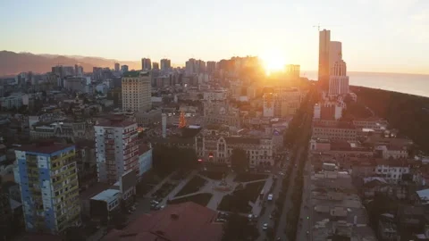 Aerial view of Batumi city panorama downtown at sunset. Flying on drone above Video stock 260673553