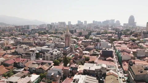 Aerial view Batumi Piazza Square with clock tower and surrounding buildings.. Stock Footage 318212737