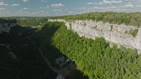 Aerial view of Baume-les-Messieurs blind valley and limestone cliffs, France Stock Footage 341838136