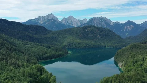 Aerial view of Bavarian Alps mountains in summer, lake Alpsee - Germany, Europe Stock Footage 114566506