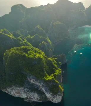 Aerial View of Bay Beach Surrounded by Green Mountains Stock Photos