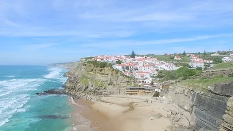 Aerial view of beach and cliffs next to Azenhas do Mar Village. Stock Footage 77518219