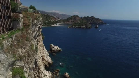 Aerial View of beach and island Isola Bella at Taormina, Sicily Stock Footage