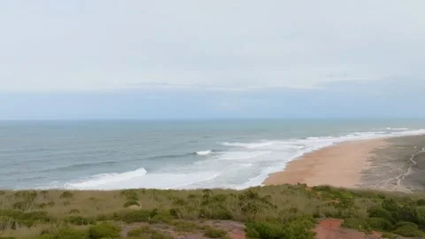 Aerial view of beach with big waves in Nazare, Portugal. This is Atlantic O.. Stock Footage 239577621