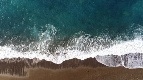 Aerial view of the beach with breaking waves Stock Photos