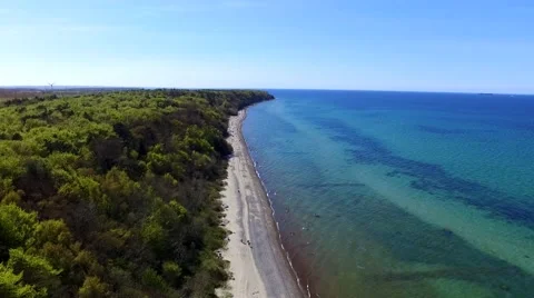 Aerial view of beach with clear blue waters - birds eye view Stock Footage 62926214