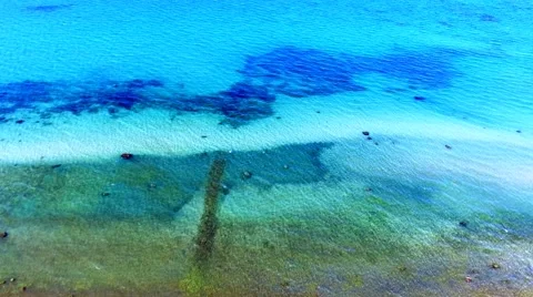 Aerial view of beach with clear blue waters - Aerial view -  birds eye view Stock Footage 62926306