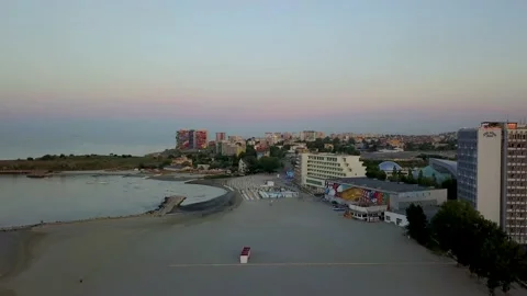 Aerial view of beach during sunset Constanta Romania Stock Footage 135990445
