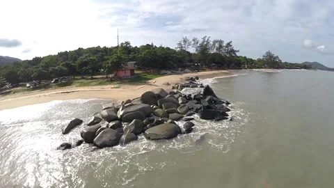 Aerial view of the beach with large rocks Stock Footage 147381131