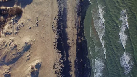 Aerial view of beach polluted with oil spill Stock Footage 296043626
