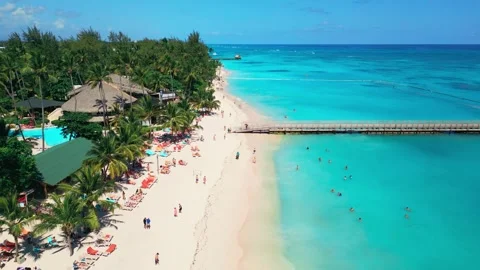 Aerial view of a beach in Punta Cana on a bright sunny day Stock Footage 309945103