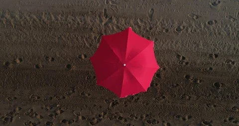 Aerial view of a beach red umbrella Stock Footage 101097647